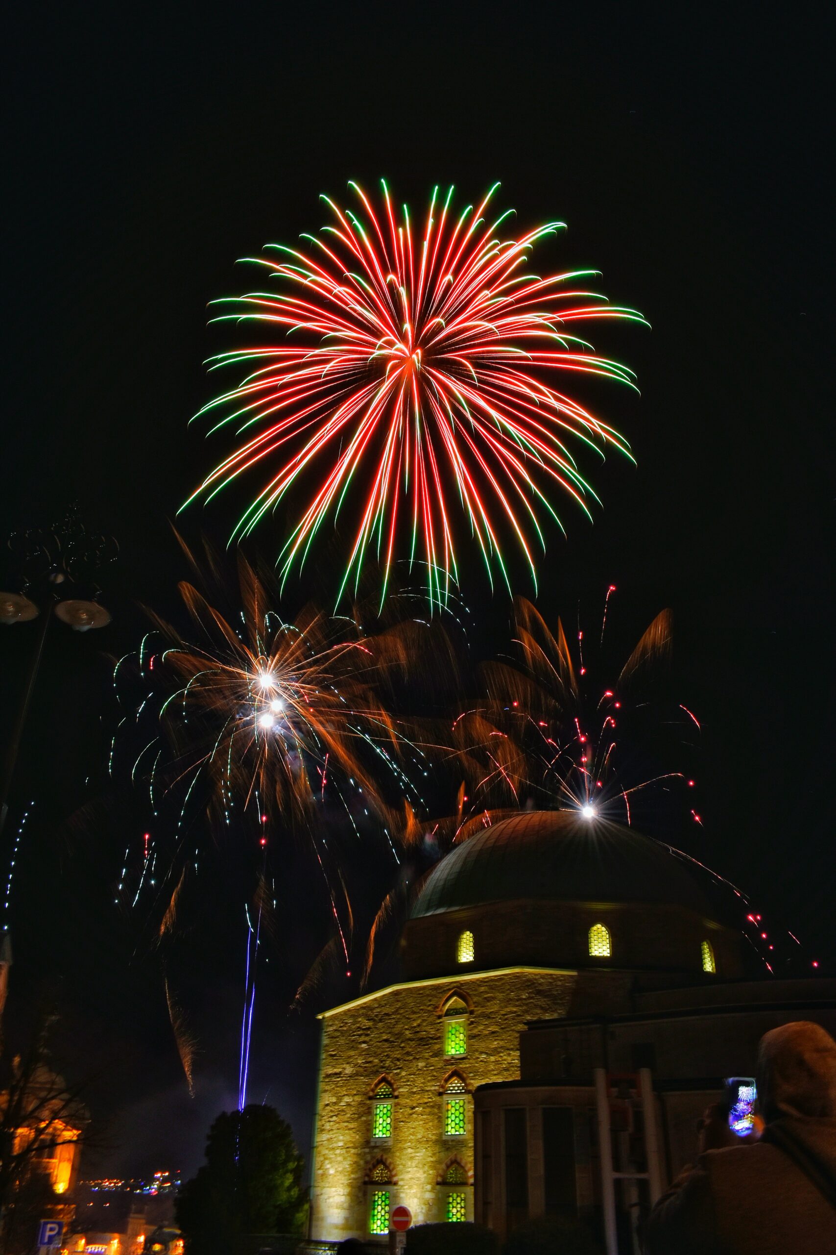 Fireworks over building.