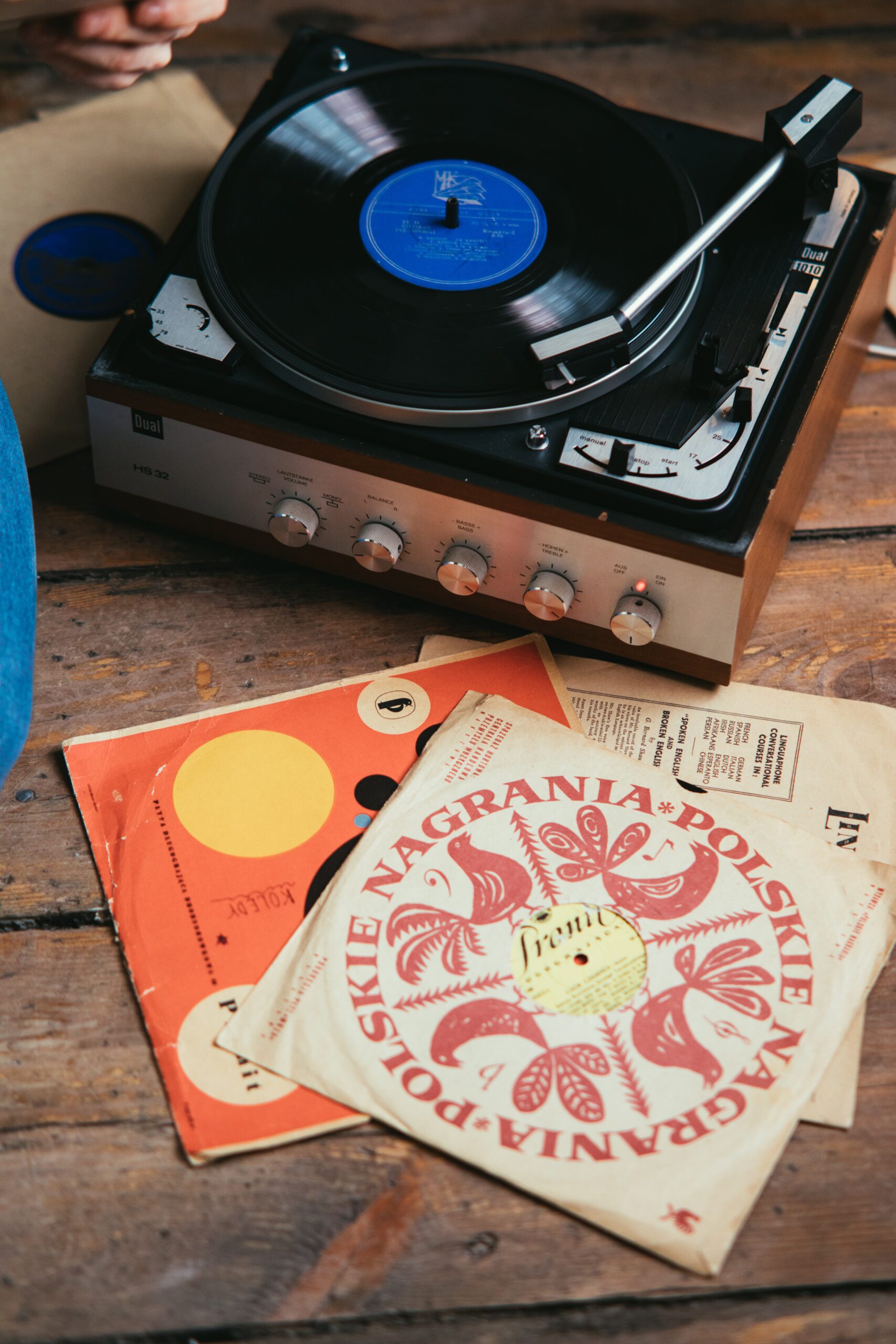 a record player with a cover for a vinyl record