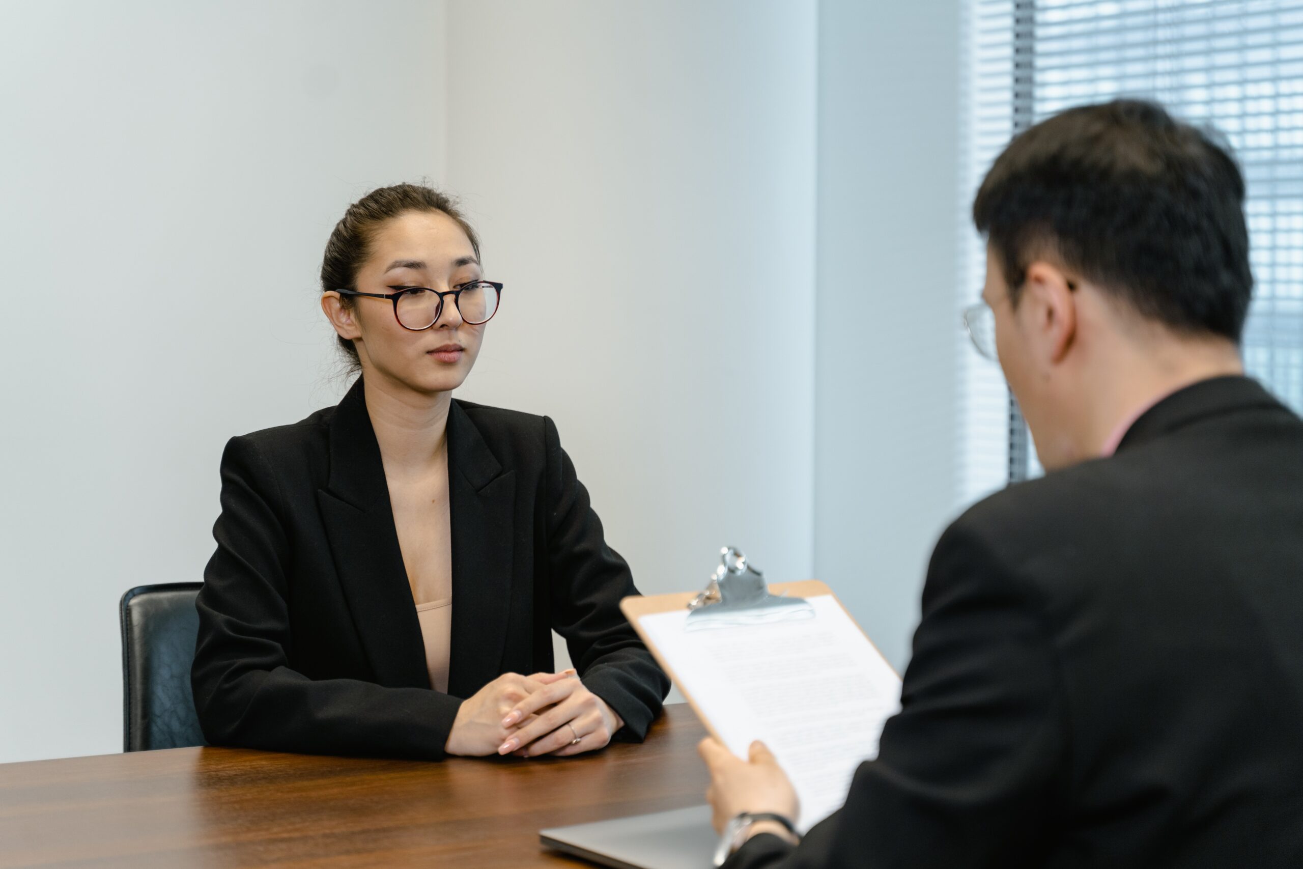 Two people in a meeting.