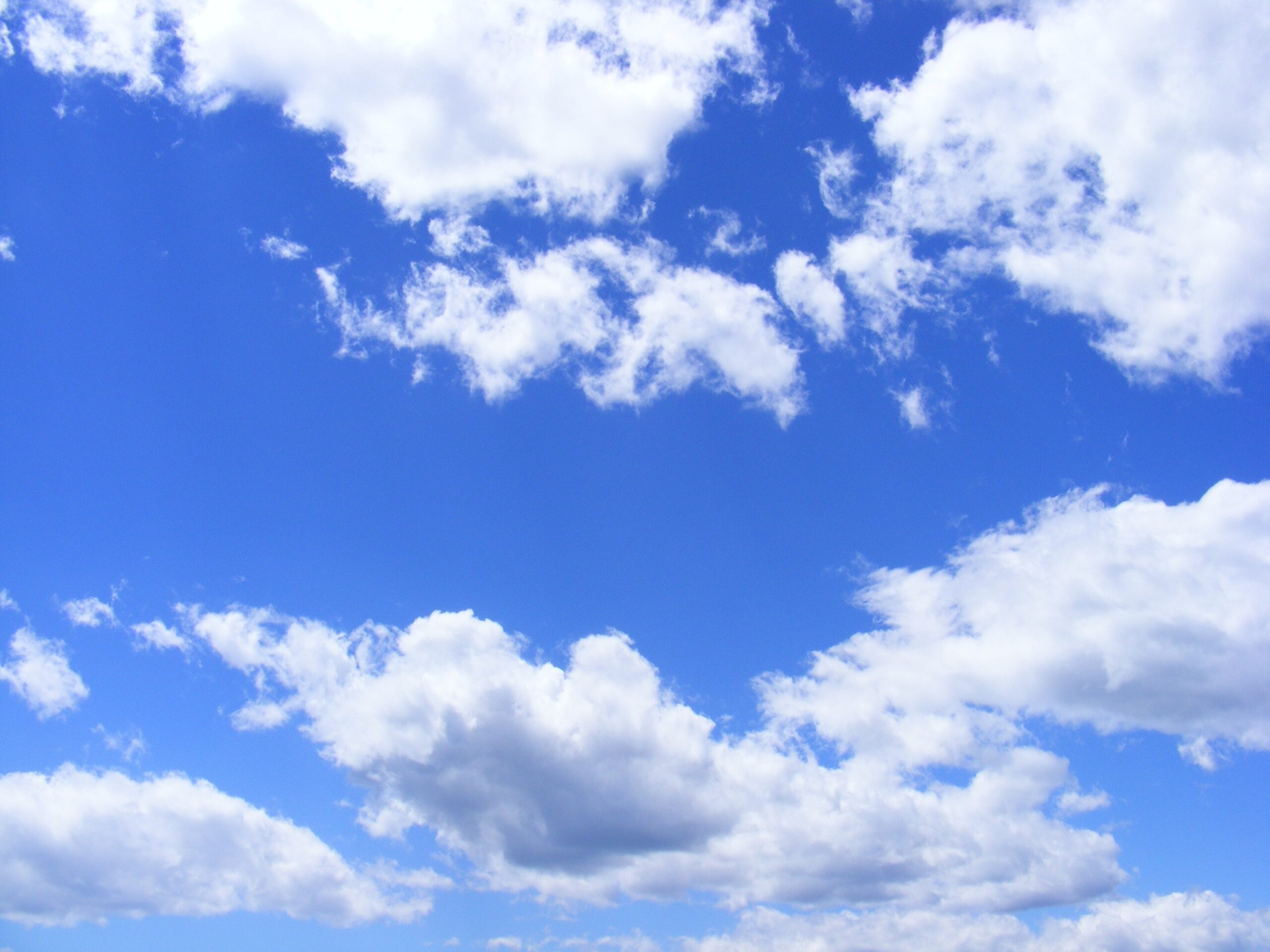 Blue sky with some white clouds.