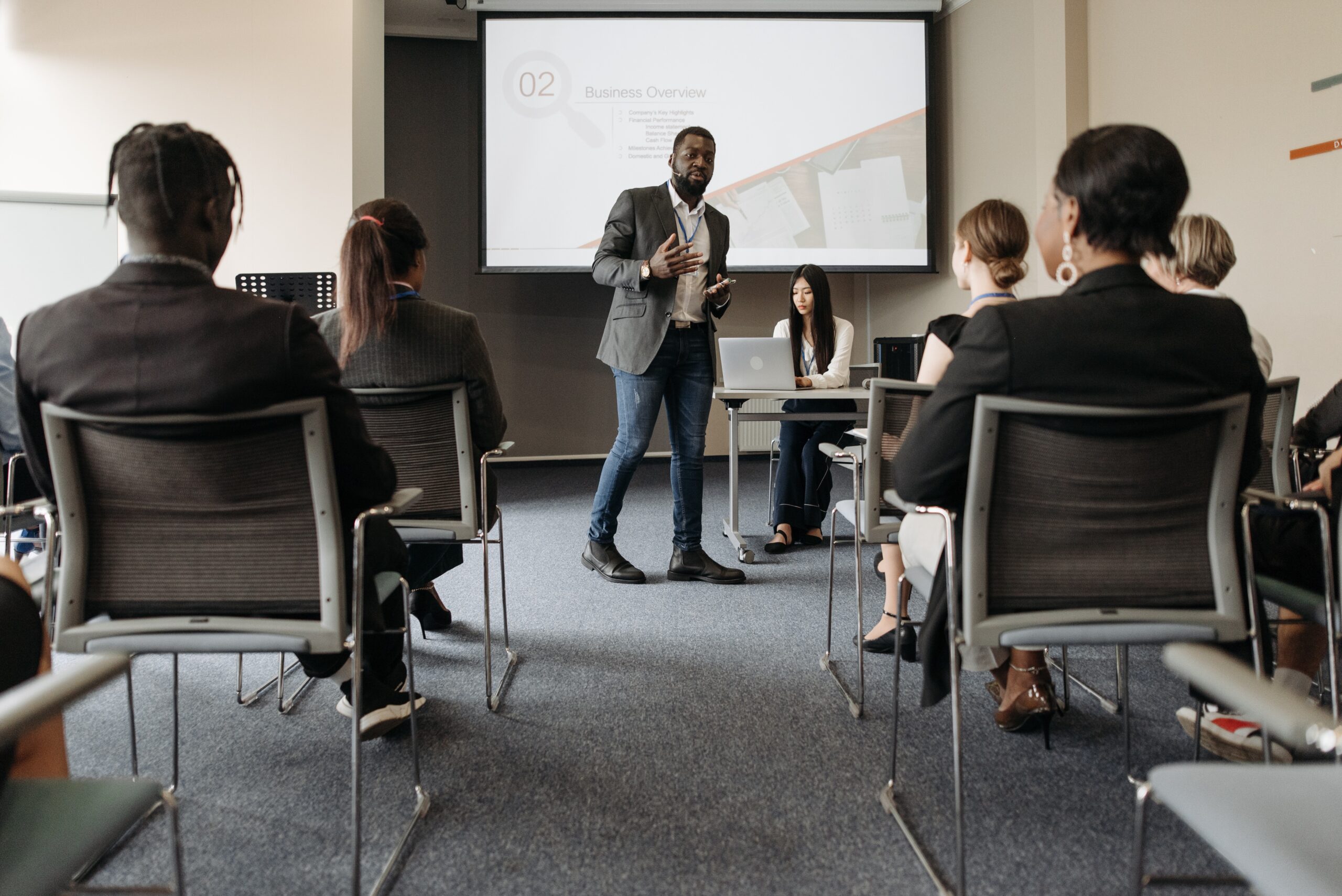 Instructor presenting to an audience.