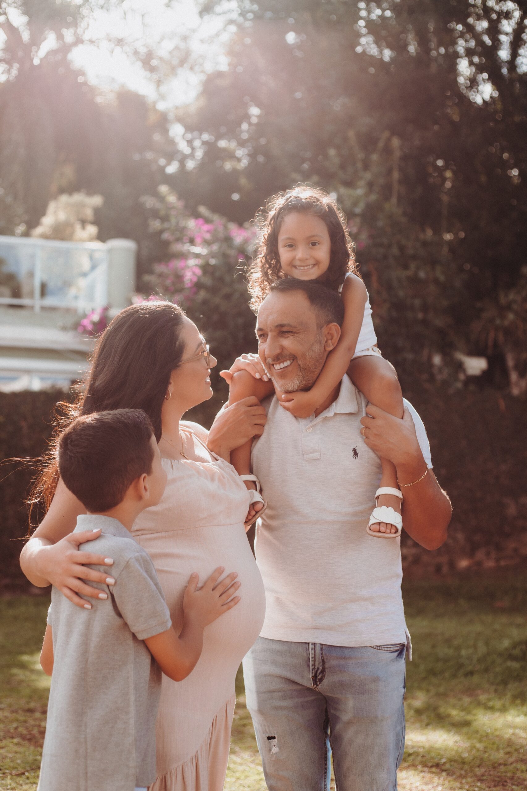 Pregnant woman, man, and two children.