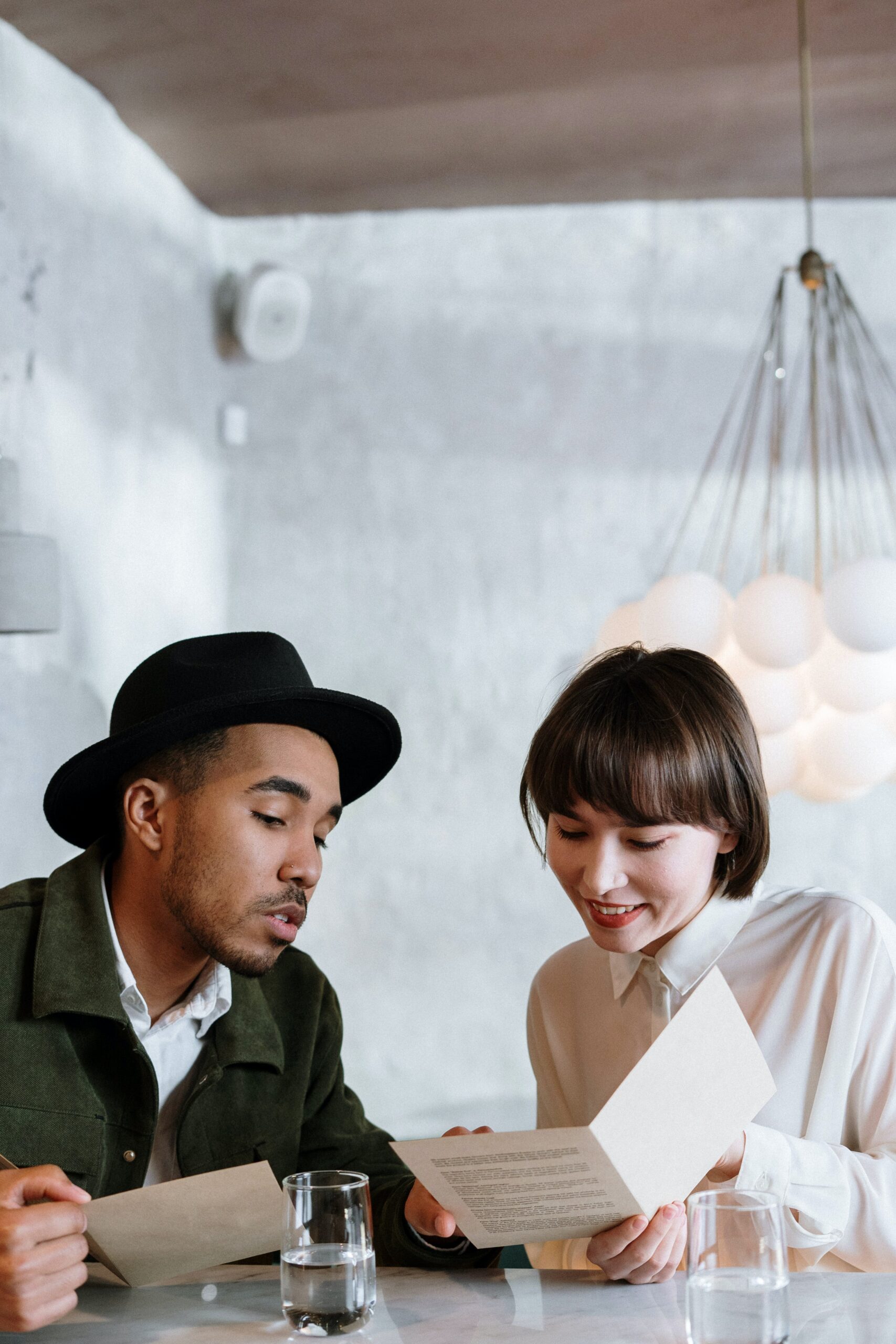 Couple looking at menus.