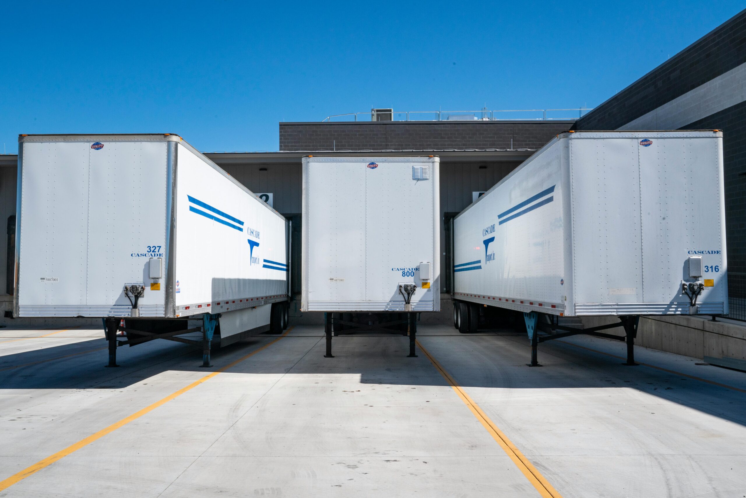 Freight trailers outside of a loading dock.