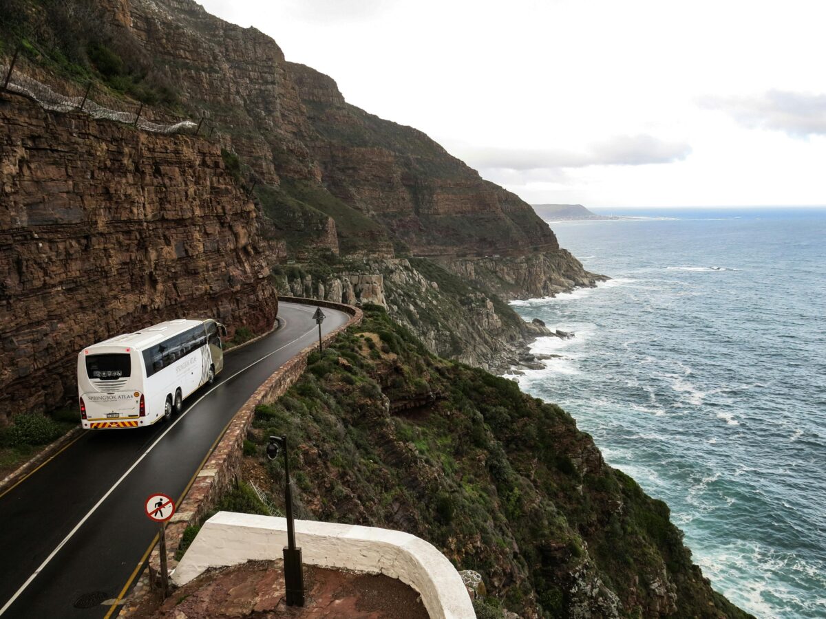 Bus on coastal road.